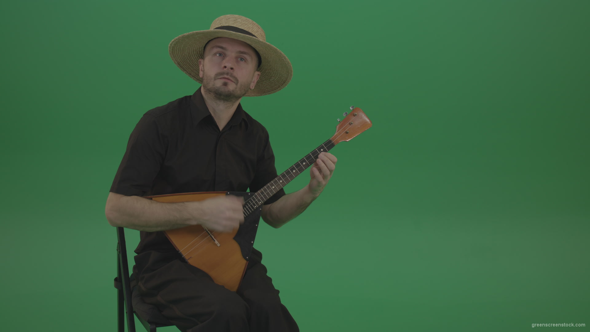 Man-from-village-play-Balalaika-music-instrument-isolated-on-green-screen_008 Green Screen Stock