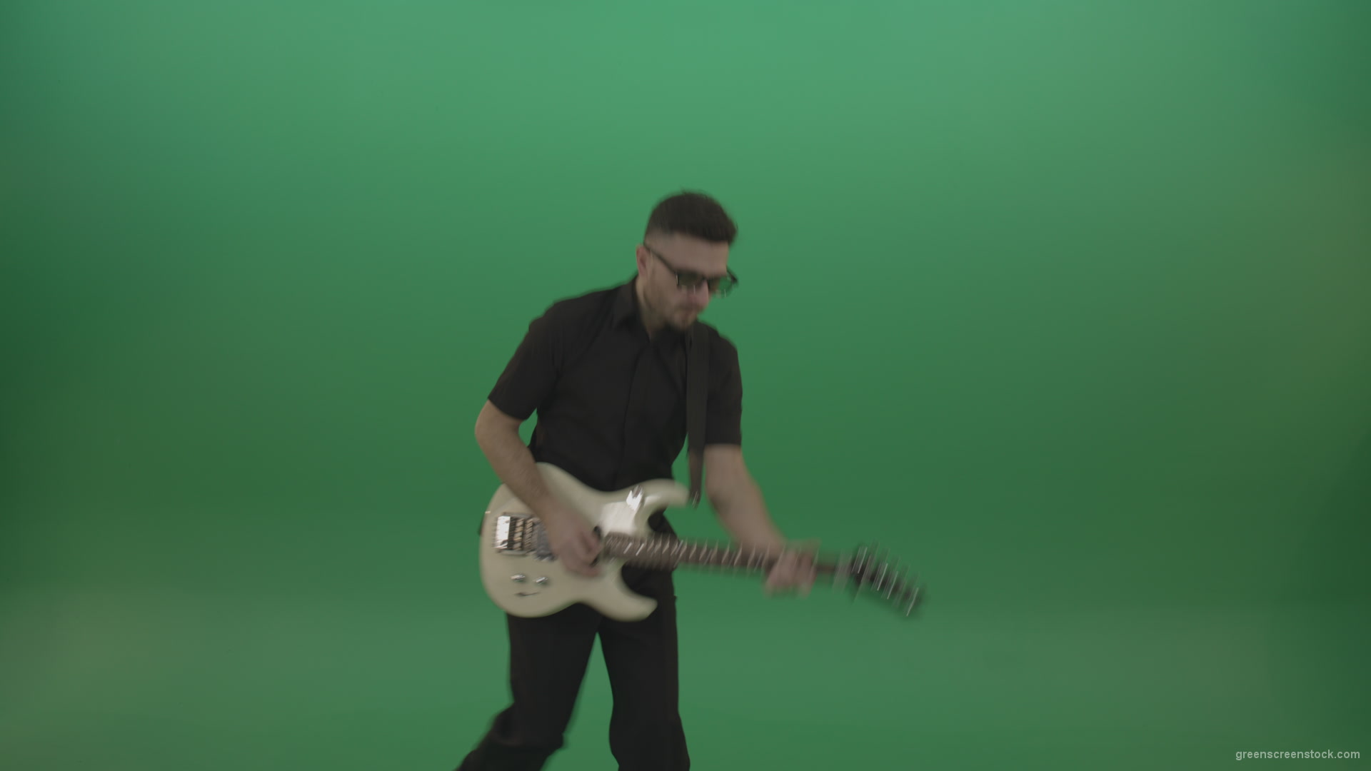 vj video background Man-in-black-costume-virtuoso-play-white-electro-rythm-guitar-isolated-on-green-screen_003