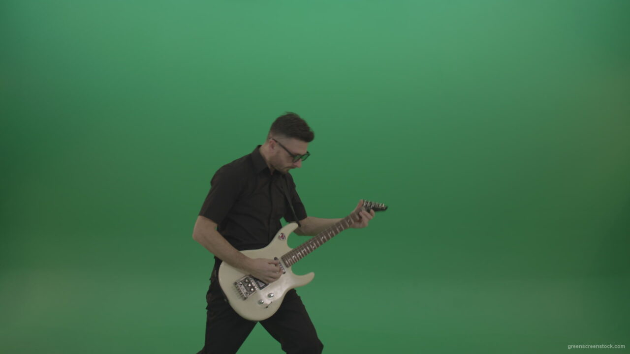 Man-in-black-costume-virtuoso-play-white-electro-rythm-guitar-isolated-on-green-screen_006 Green Screen Stock