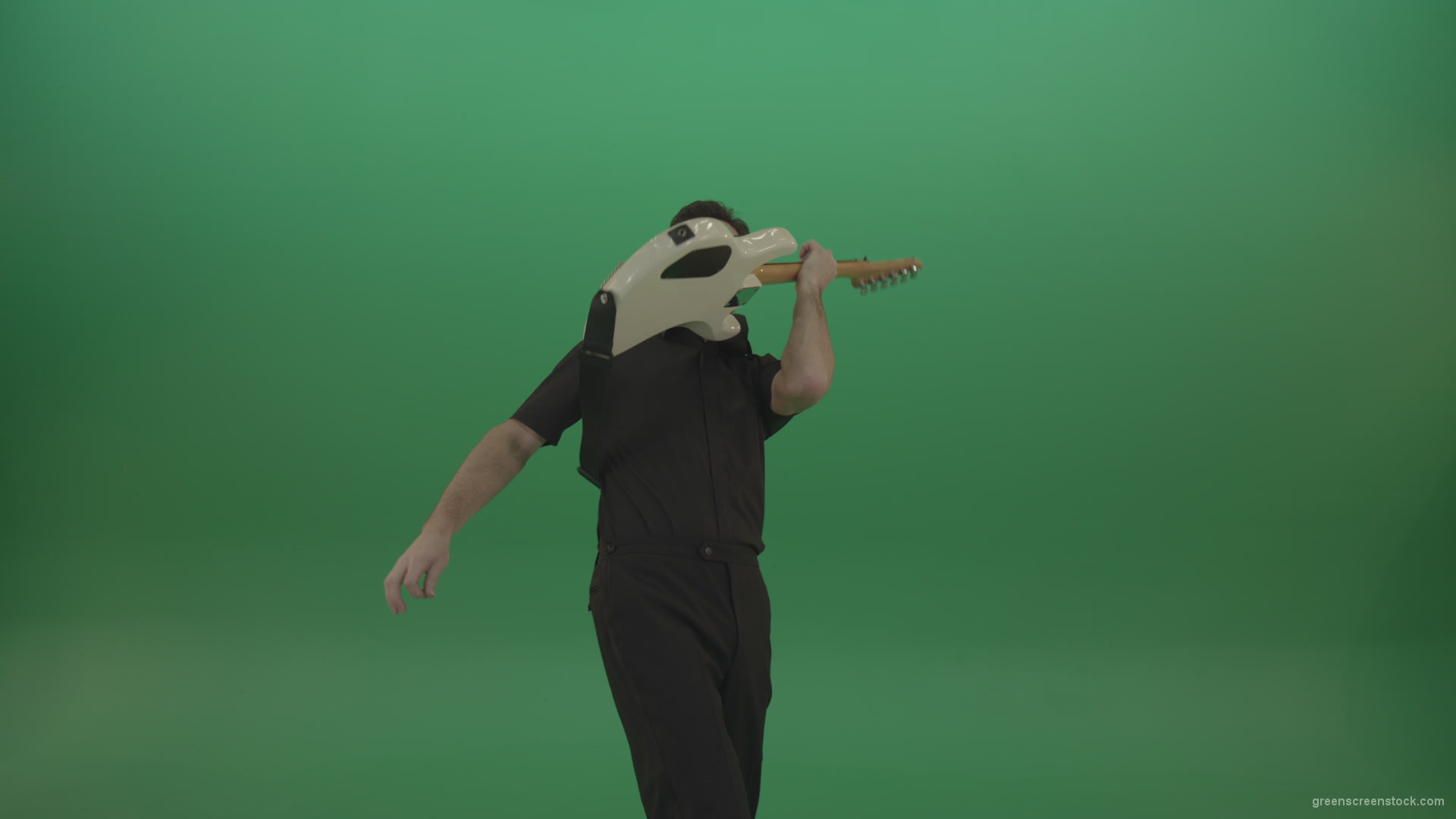 Man-in-black-costume-virtuoso-play-white-electro-rythm-guitar-isolated-on-green-screen_008 Green Screen Stock
