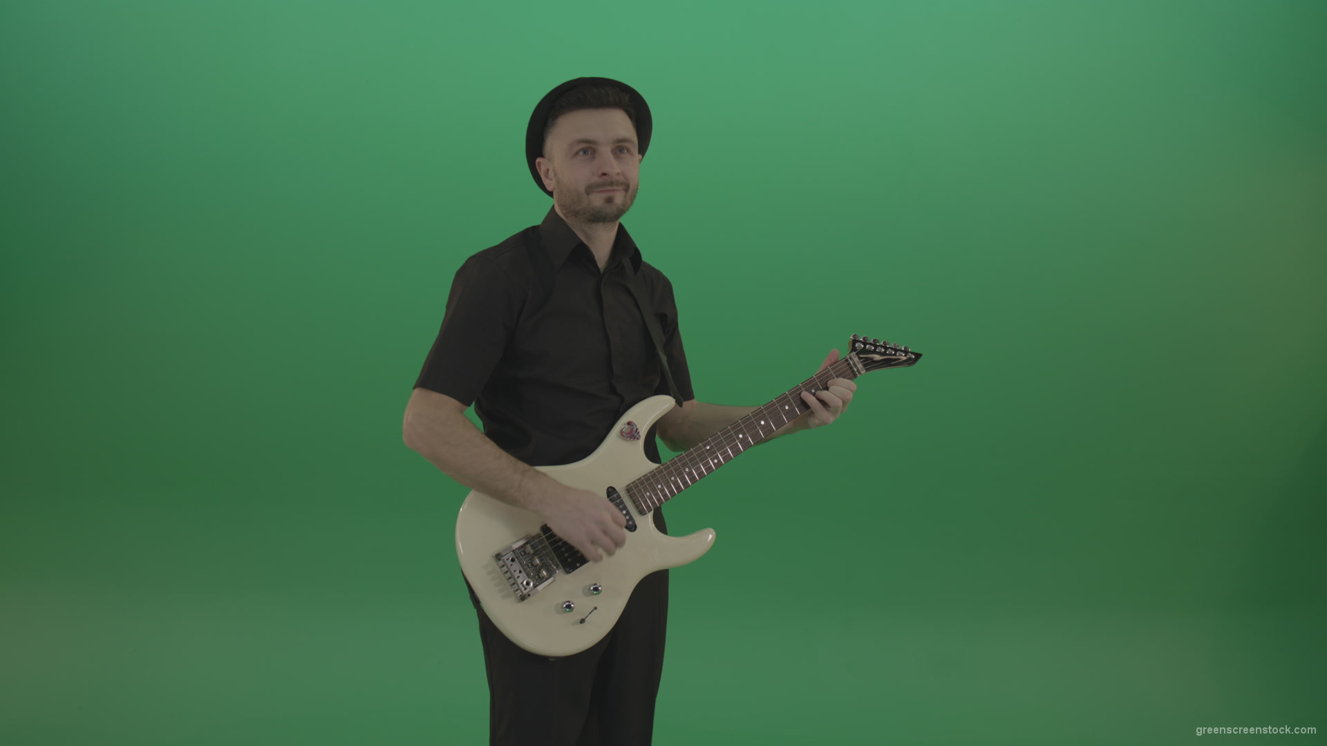 Man-in-black-playing-white-guitar-on-green-screen-1_005 Green Screen Stock