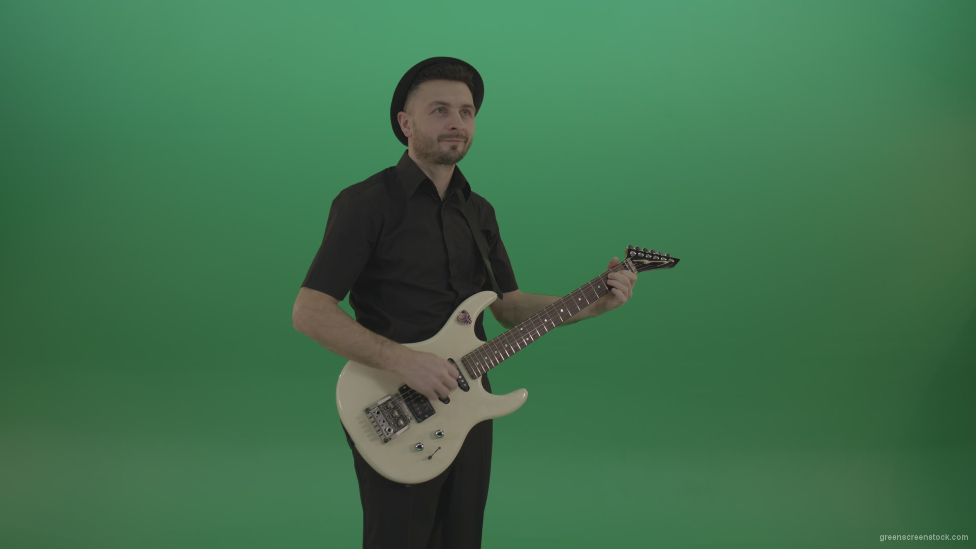 Man-in-black-playing-white-guitar-on-green-screen-1_006 Green Screen Stock