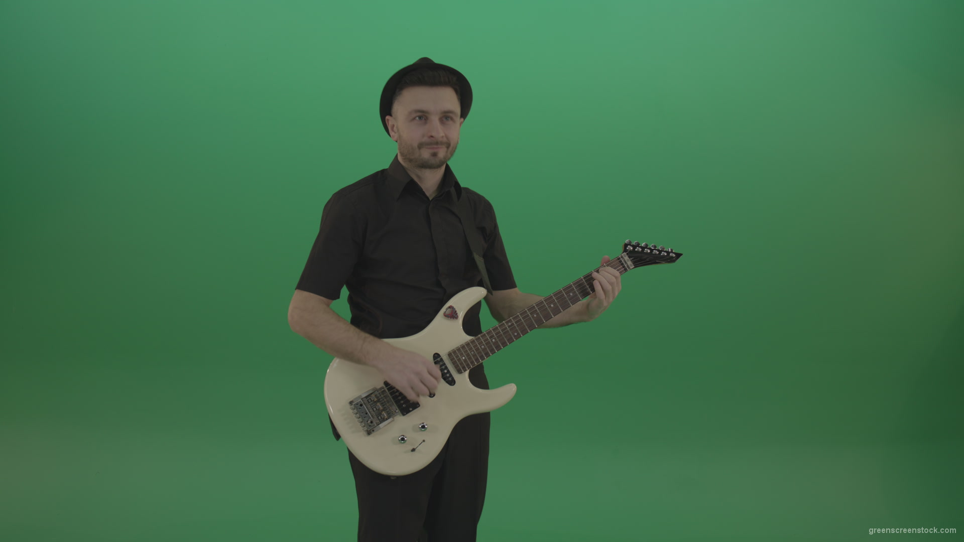 Man-in-black-playing-white-guitar-on-green-screen-1_007 Green Screen Stock