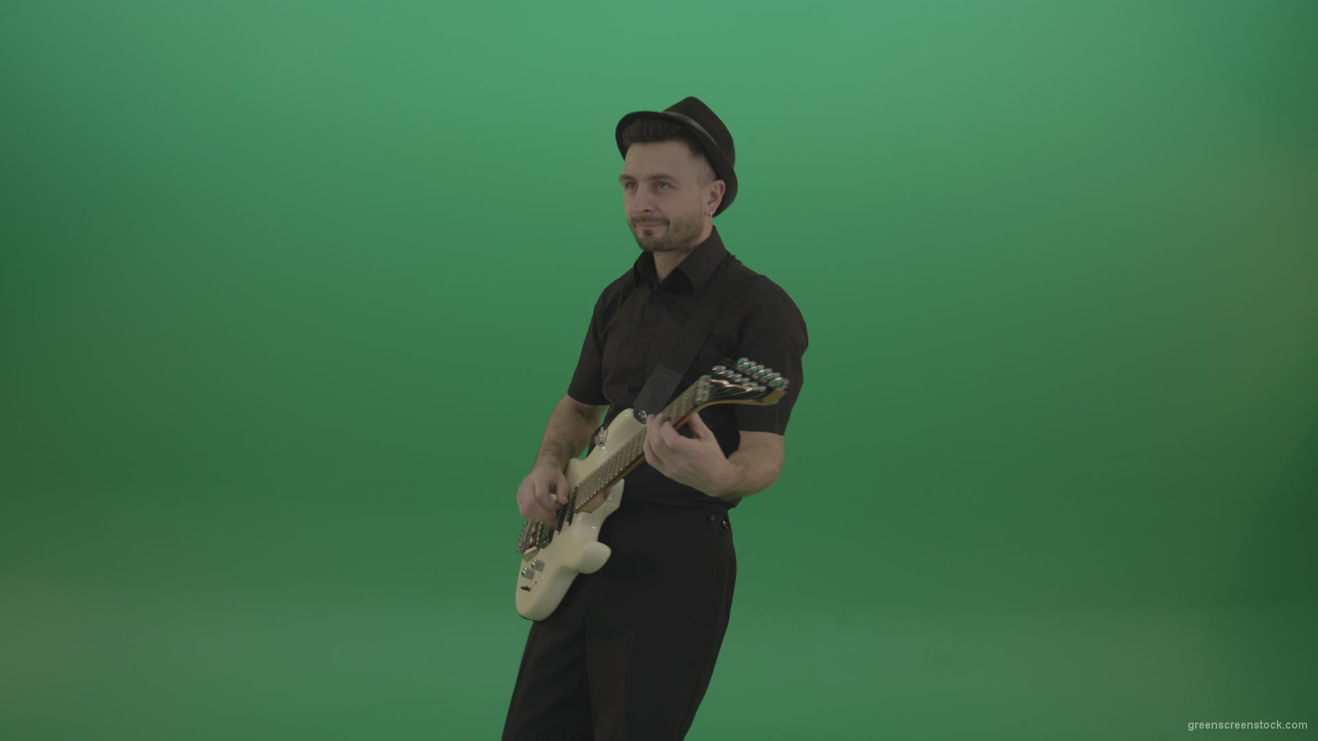 Man-in-black-playing-white-guitar-on-green-screen-1_008 Green Screen Stock