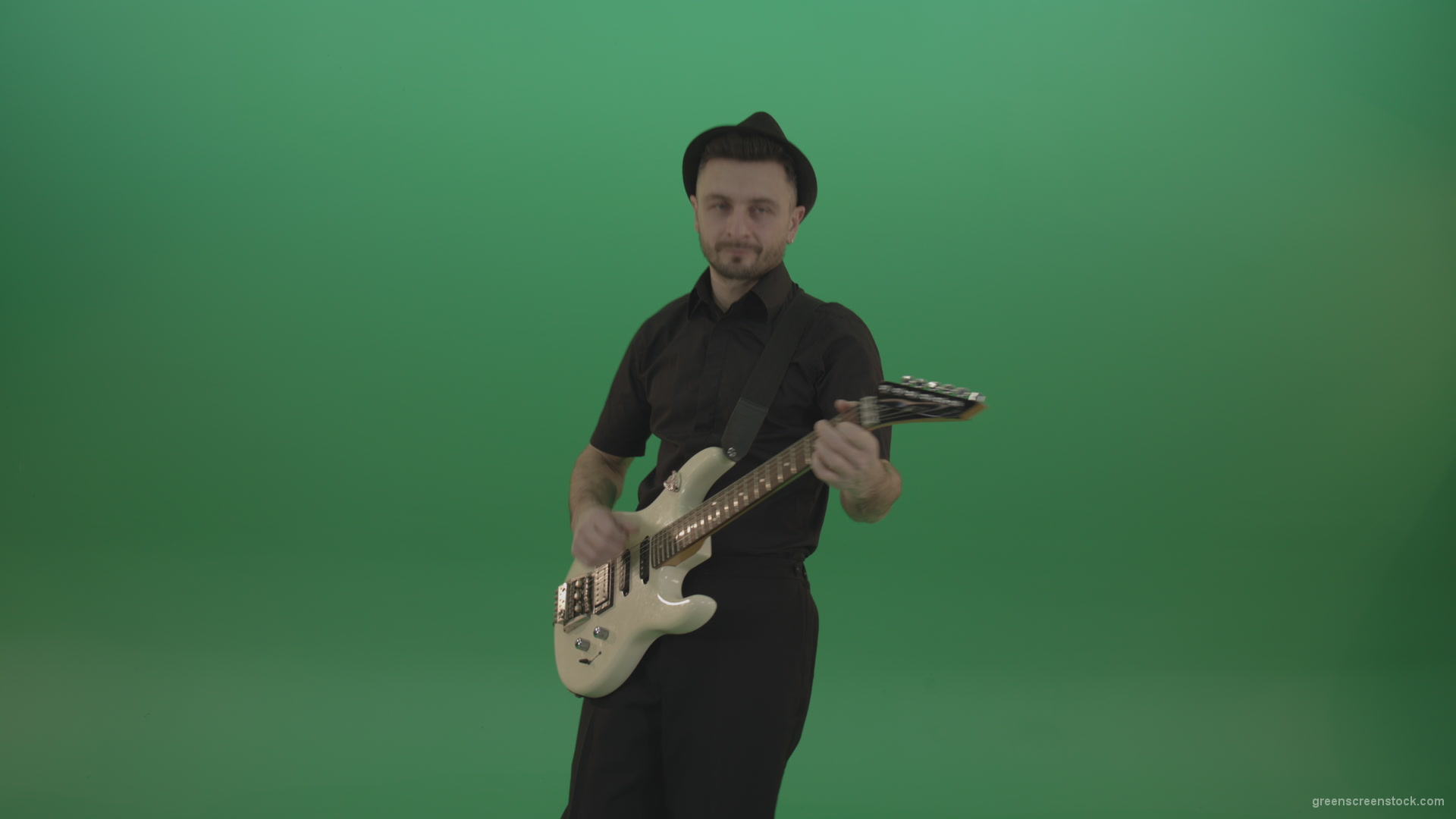 Man-in-black-playing-white-guitar-on-green-screen-1_009 Green Screen Stock
