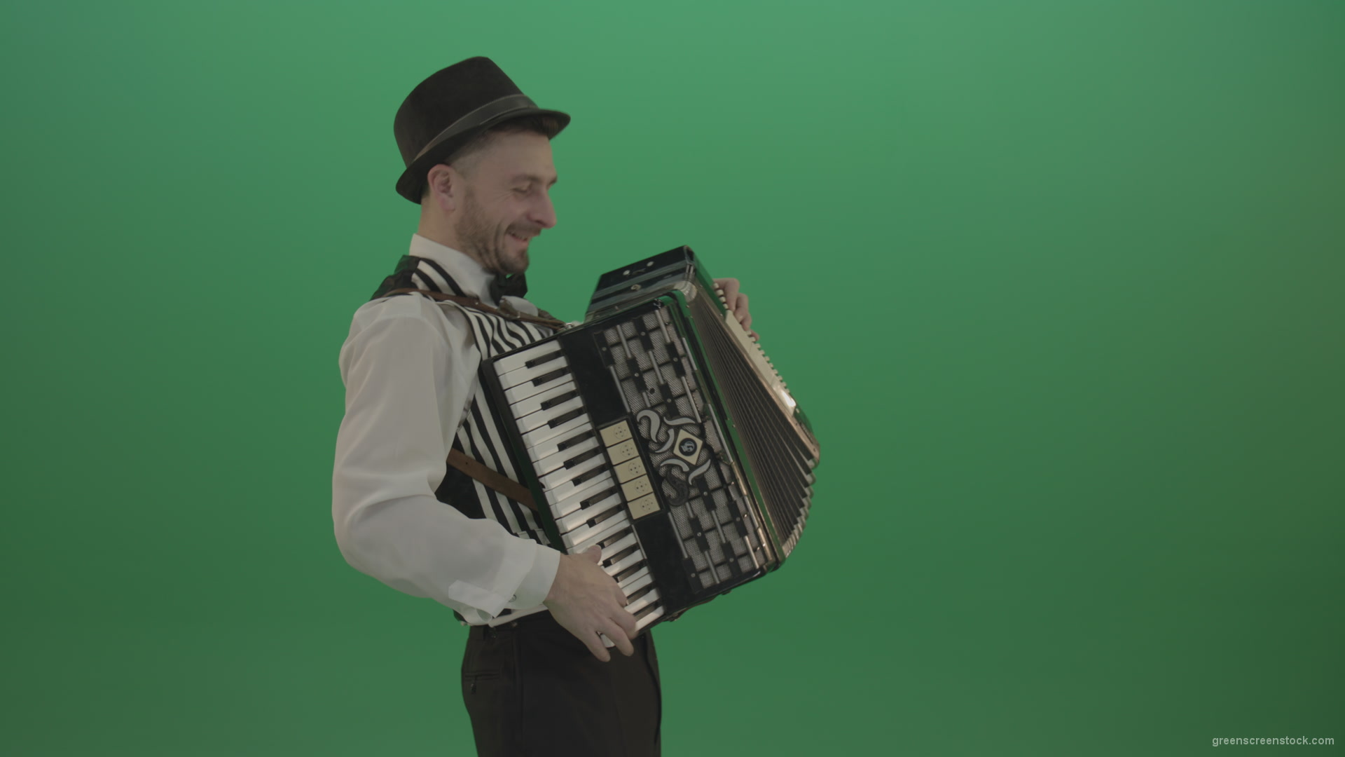 Man-in-hat-playing-Accordion-jazz-music-on-wedding-in-side-view-isolated-on-green-screen_004 Green Screen Stock
