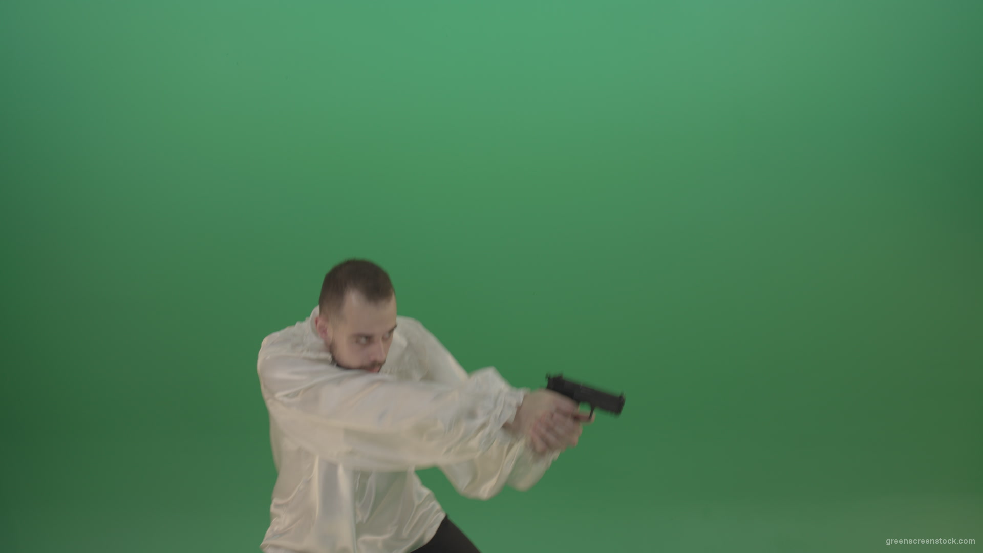 Man-in-white-shirt-shooting-with-pistol-hand-gun-isolated-in-green-screen-studio_006 Green Screen Stock