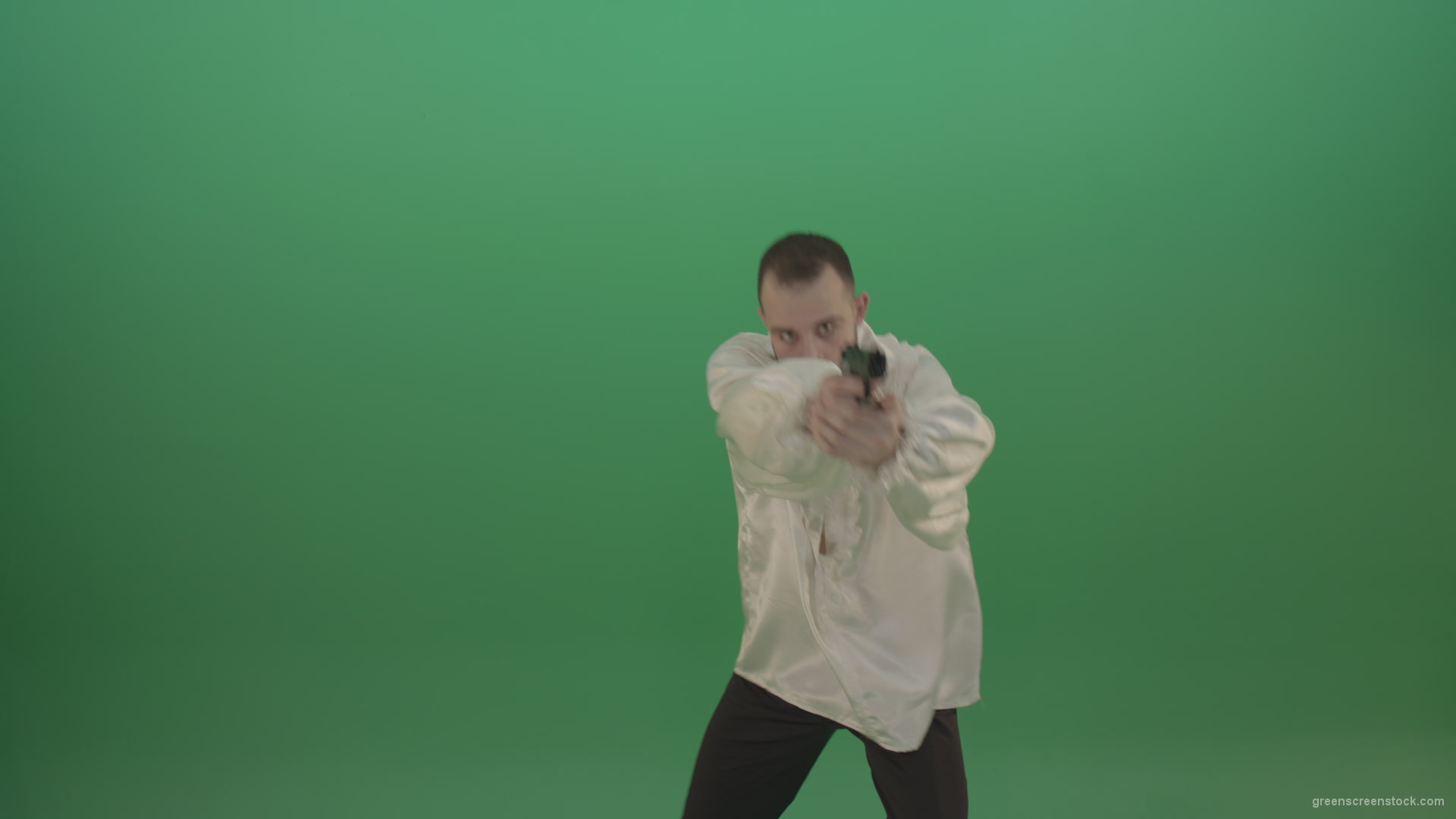 Man-in-white-shirt-shooting-with-pistol-hand-gun-isolated-in-green-screen-studio_007 Green Screen Stock