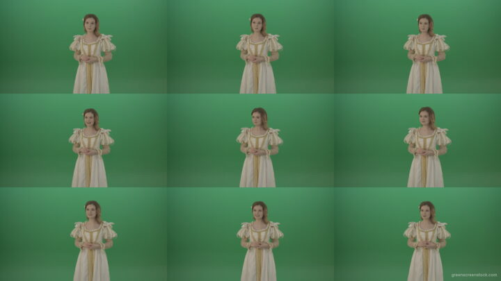 Medieval-girl-in-a-white-suit-looking-far-away-isolated-on-green-background Green Screen Stock