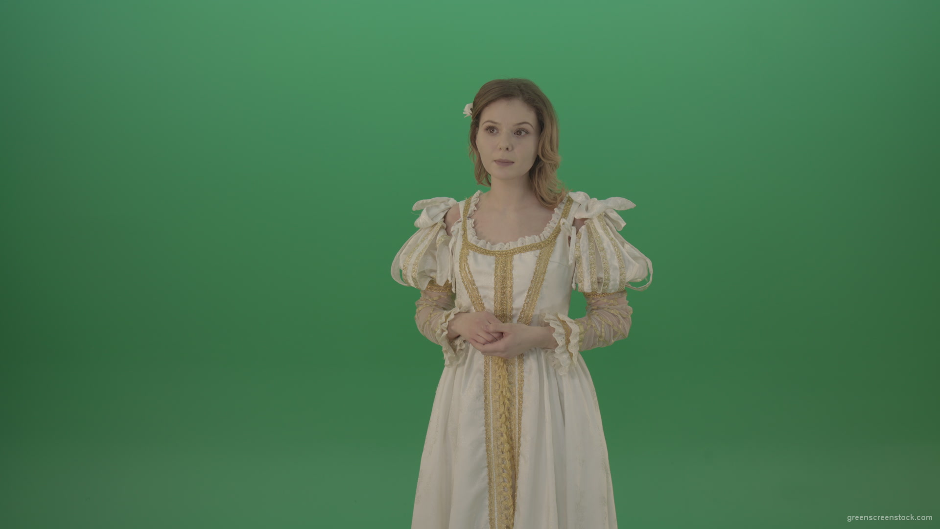Medieval-girl-in-a-white-suit-looking-far-away-isolated-on-green-background_001 Green Screen Stock
