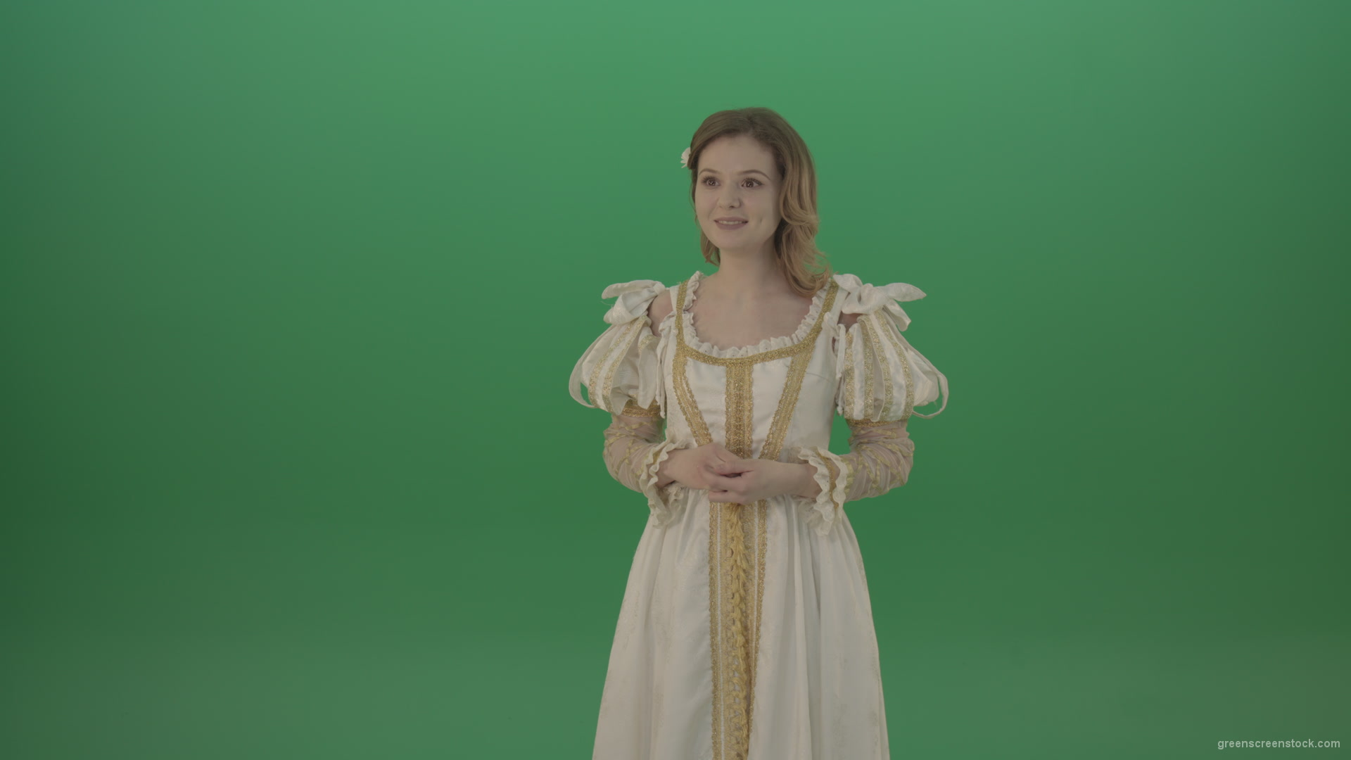 Medieval-girl-in-a-white-suit-looking-far-away-isolated-on-green-background_007 Green Screen Stock