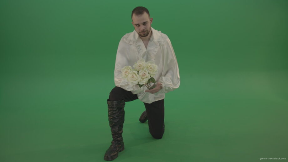 vj video background Medieval-man-gives-white-flowers-standing-on-one-knee-isolated-in-green-screen-studio_003