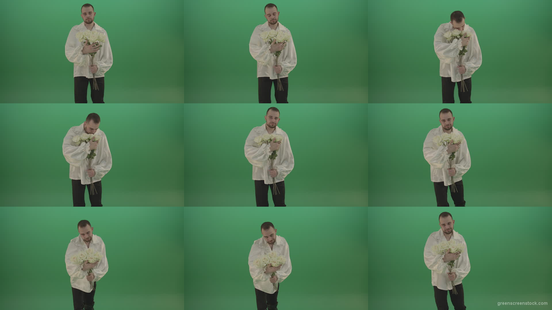 Middle-Age-theater-actor-boy-give-to-camera-White-flowers-isolated-on-green-background Green Screen Stock