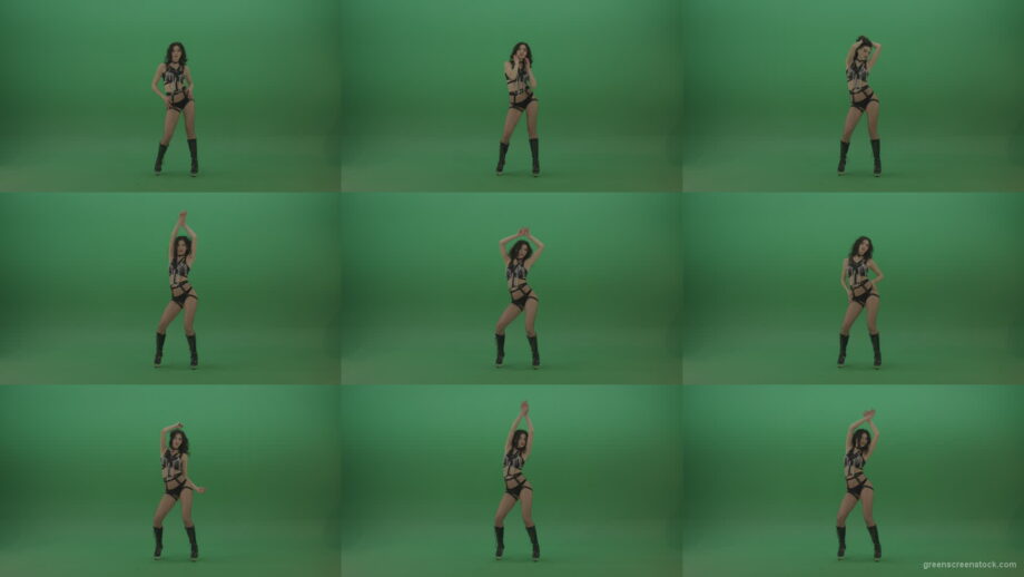 Pretty-black-haired-woman-in-an-erotic-suit-cycles-repetitive-movements-on-green-background. Green Screen Stock