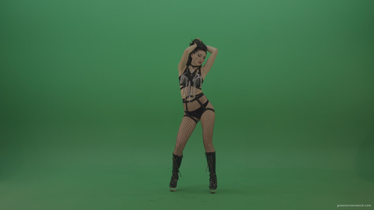 vj video background Pretty-black-haired-woman-in-an-erotic-suit-cycles-repetitive-movements-on-green-background._003
