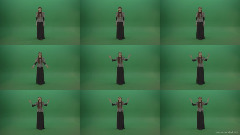 Redheaded-girl-in-full-height-in-medieval-warrior-clothing-asks-for-help-from-the-gods-on-green-screen Green Screen Stock