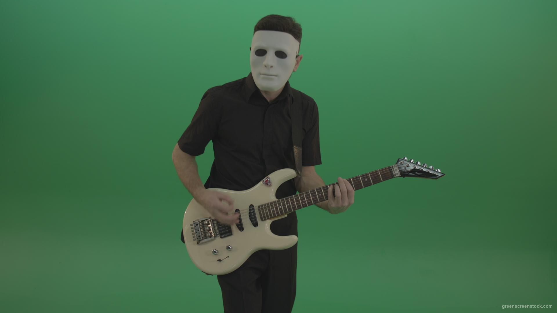 Rock-man-in-white-mask-and-black-wear-playing-guitar-isolated-on-green-screen-in-front-view_004 Green Screen Stock