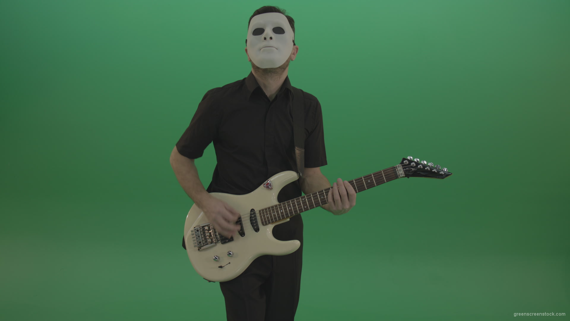 Rock-man-in-white-mask-and-black-wear-playing-guitar-isolated-on-green-screen-in-front-view_005 Green Screen Stock