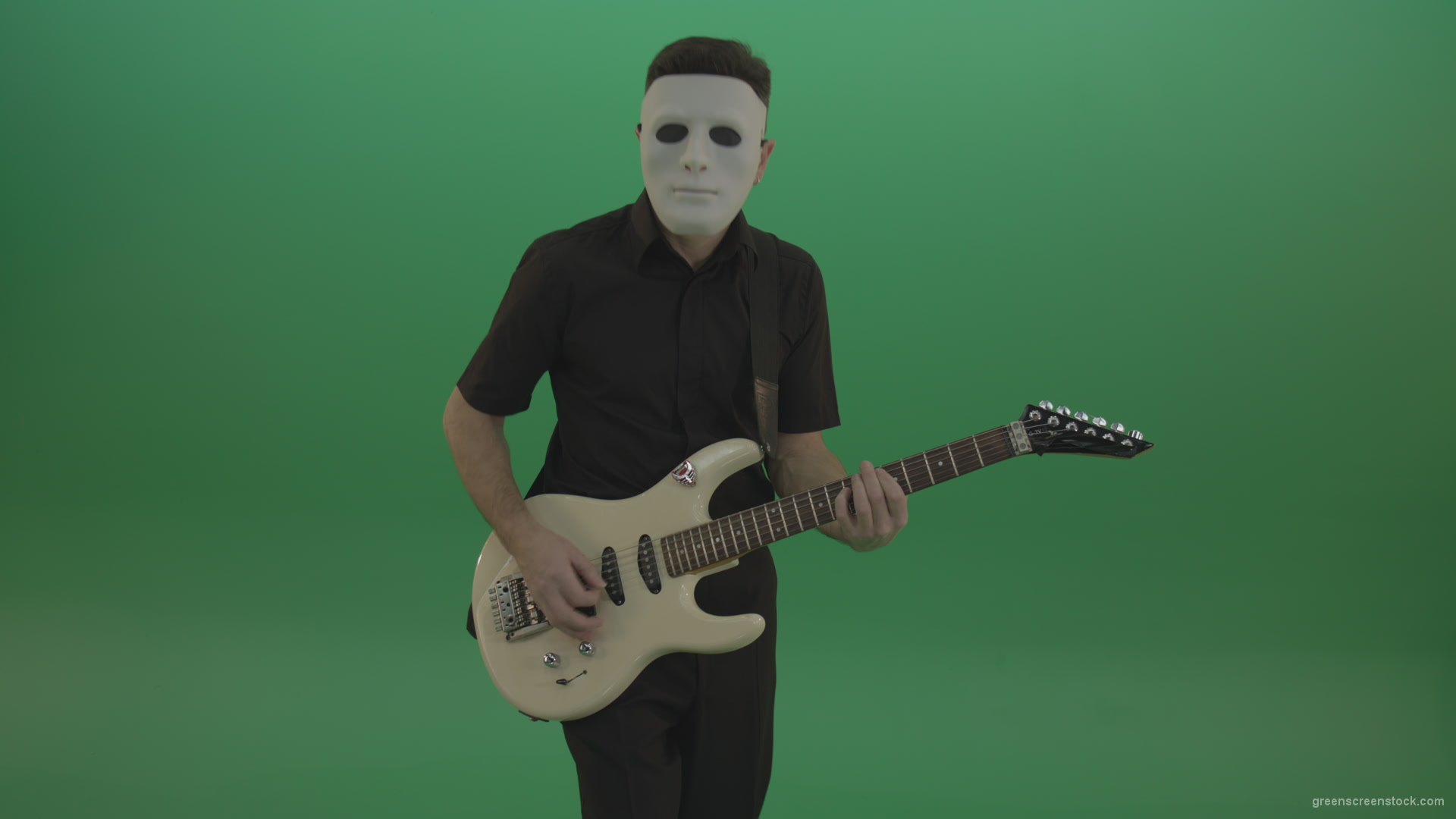 Rock-man-in-white-mask-and-black-wear-playing-guitar-isolated-on-green-screen-in-front-view_006 Green Screen Stock