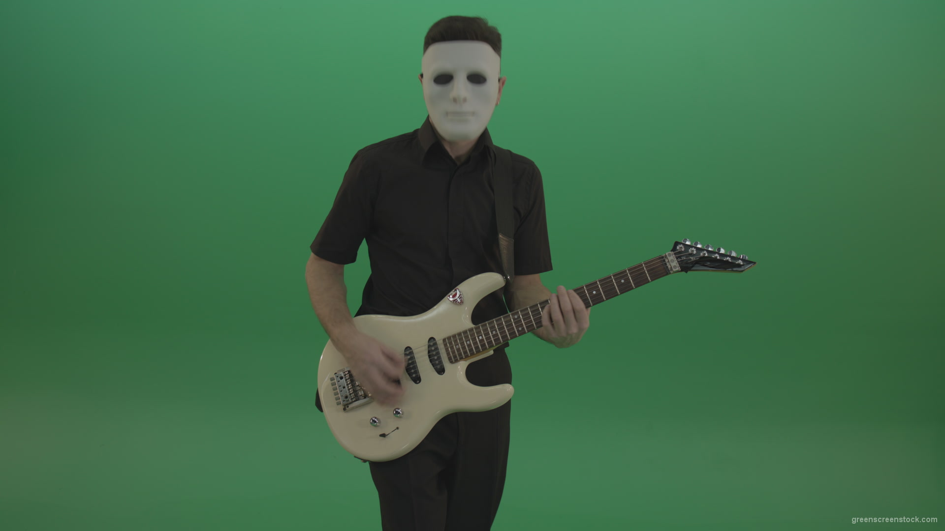 Rock-man-in-white-mask-and-black-wear-playing-guitar-isolated-on-green-screen-in-front-view_007 Green Screen Stock