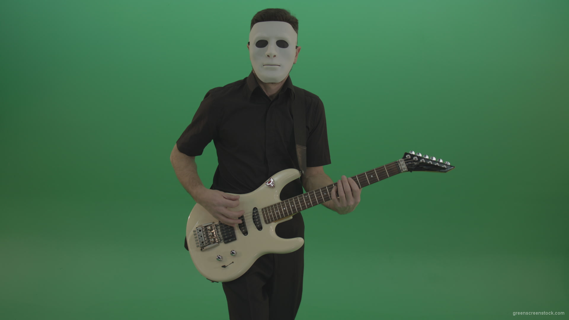 Rock-man-in-white-mask-and-black-wear-playing-guitar-isolated-on-green-screen-in-front-view_008 Green Screen Stock
