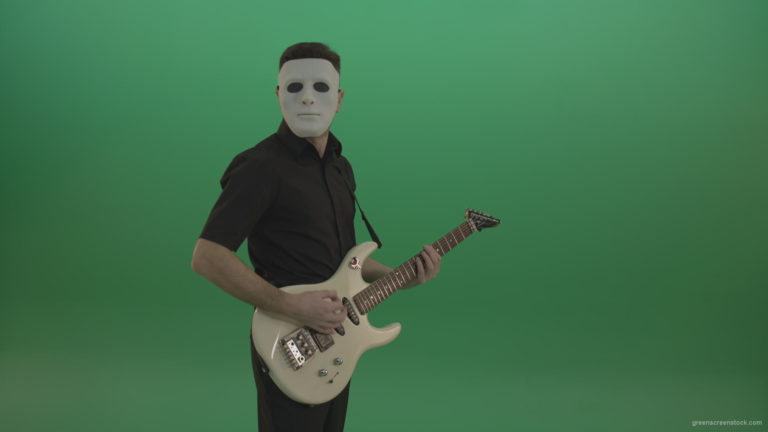 Rock-man-in-white-mask-and-black-wear-playing-guitar-isolated-on-green-screen-in-side-view_007 Green Screen Stock