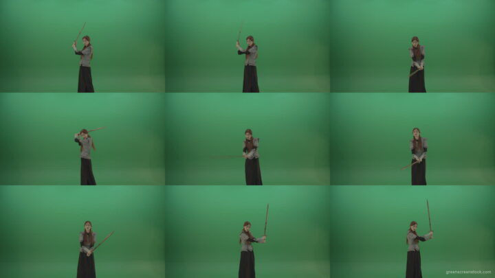 Swinging-on-a-green-background-with-a-sword-the-girl-gracefully-shows-her-strength Green Screen Stock