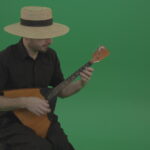 vj video background Village-guy-in-the-hat-plays-fun-on-the-balalaika_003