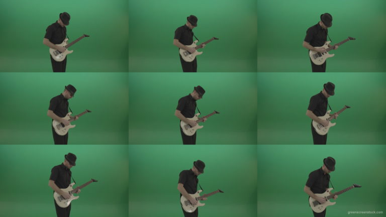 Virtuoso-guitarist-in-black-costume-and-hat-playing-solo-on-white-electro-guitar-siolated-on-green-screen Green Screen Stock