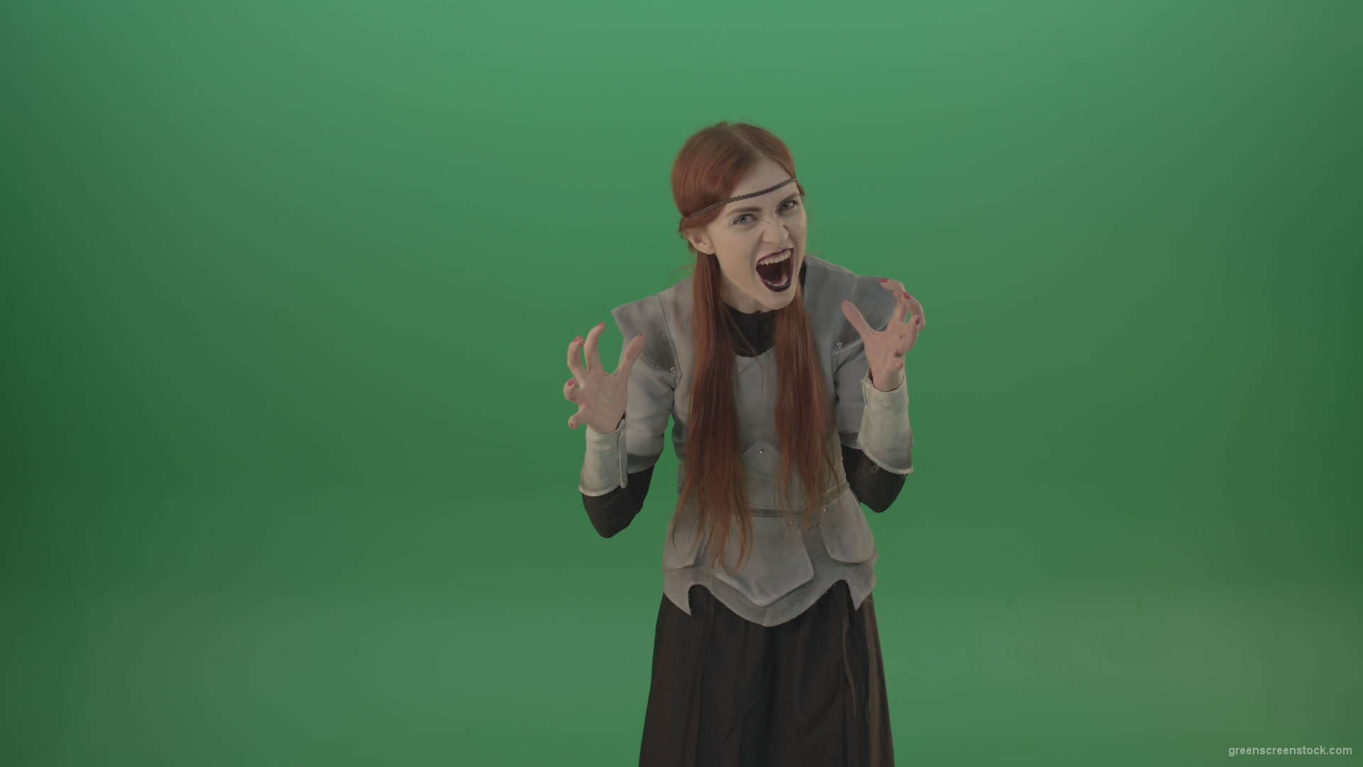 Witch-aggressively-shouts-at-the-camera-provoking-the-viewer_006 Green Screen Stock