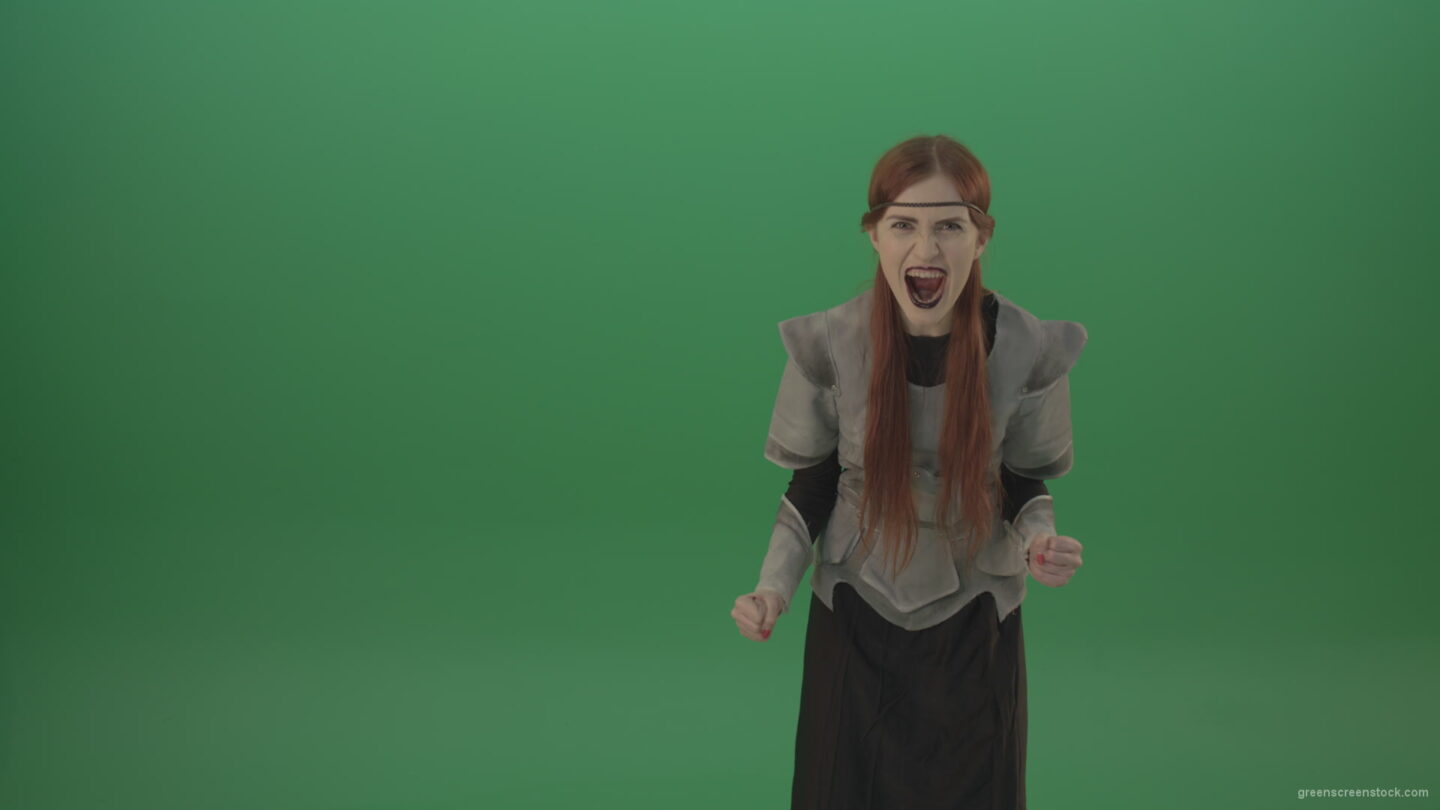 vj video background Witch-girl-watched-and-screamed-at-the-camera-with-green-eyes-on-a-green-background_003