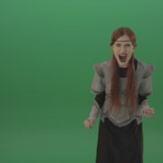 vj video background Witch-girl-watched-and-screamed-at-the-camera-with-green-eyes-on-a-green-background_003