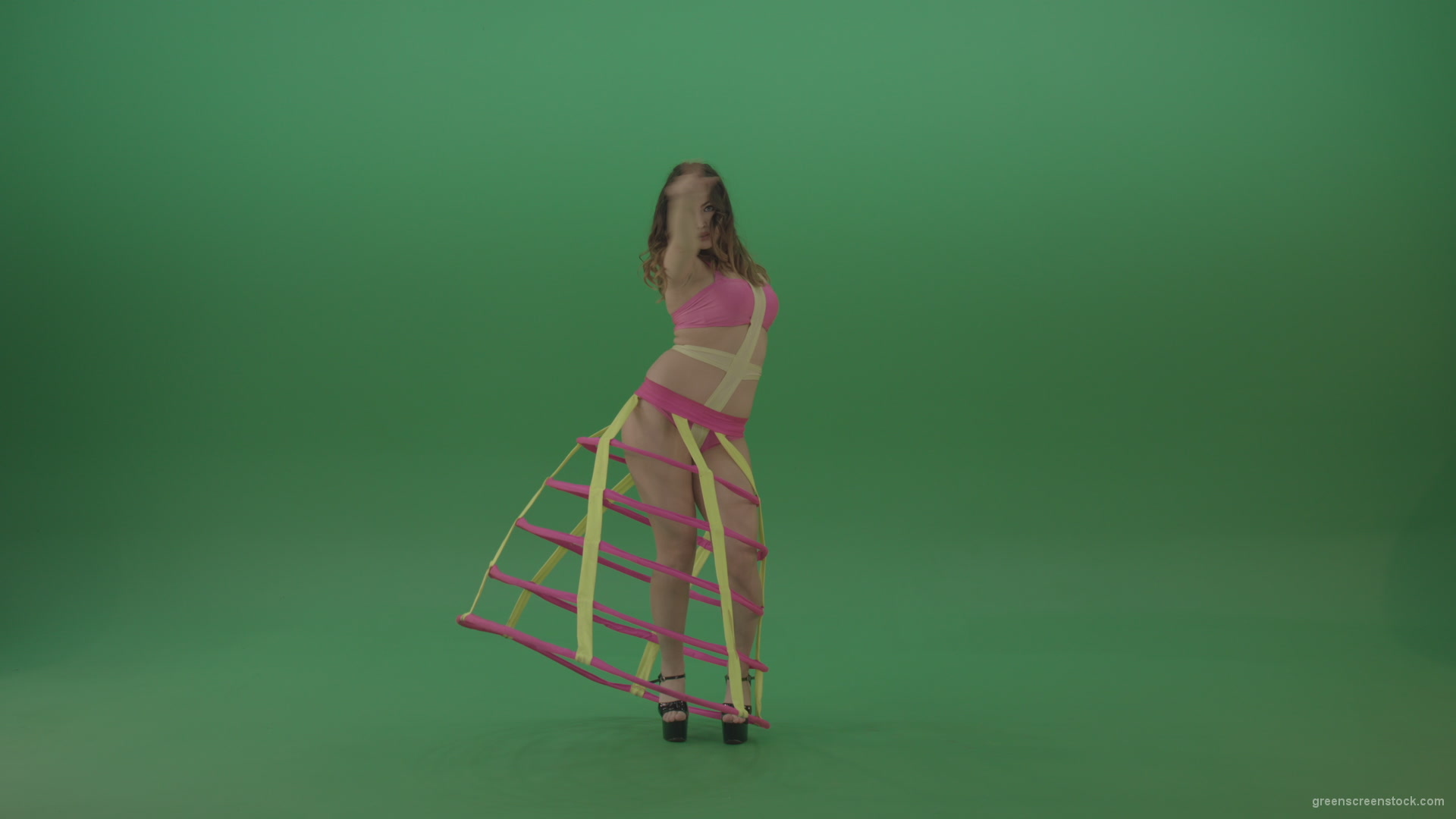 With-a-beautiful-appearance-brunette-in-an-extraordinary-costume-dancing-on-green-screen_005 Green Screen Stock