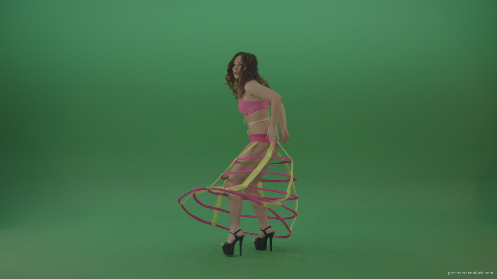 With-a-beautiful-appearance-brunette-in-an-extraordinary-costume-dancing-on-green-screen_006 Green Screen Stock