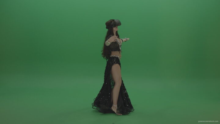 vj video background Beautiful-belly-dancer-in-black-wear-and-VR-gear-dances-over-green-screen-background_003