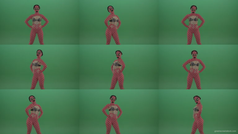 Fetish-Girl-in-sexy-costume-with-chains-posing-on-green-screen Green Screen Stock