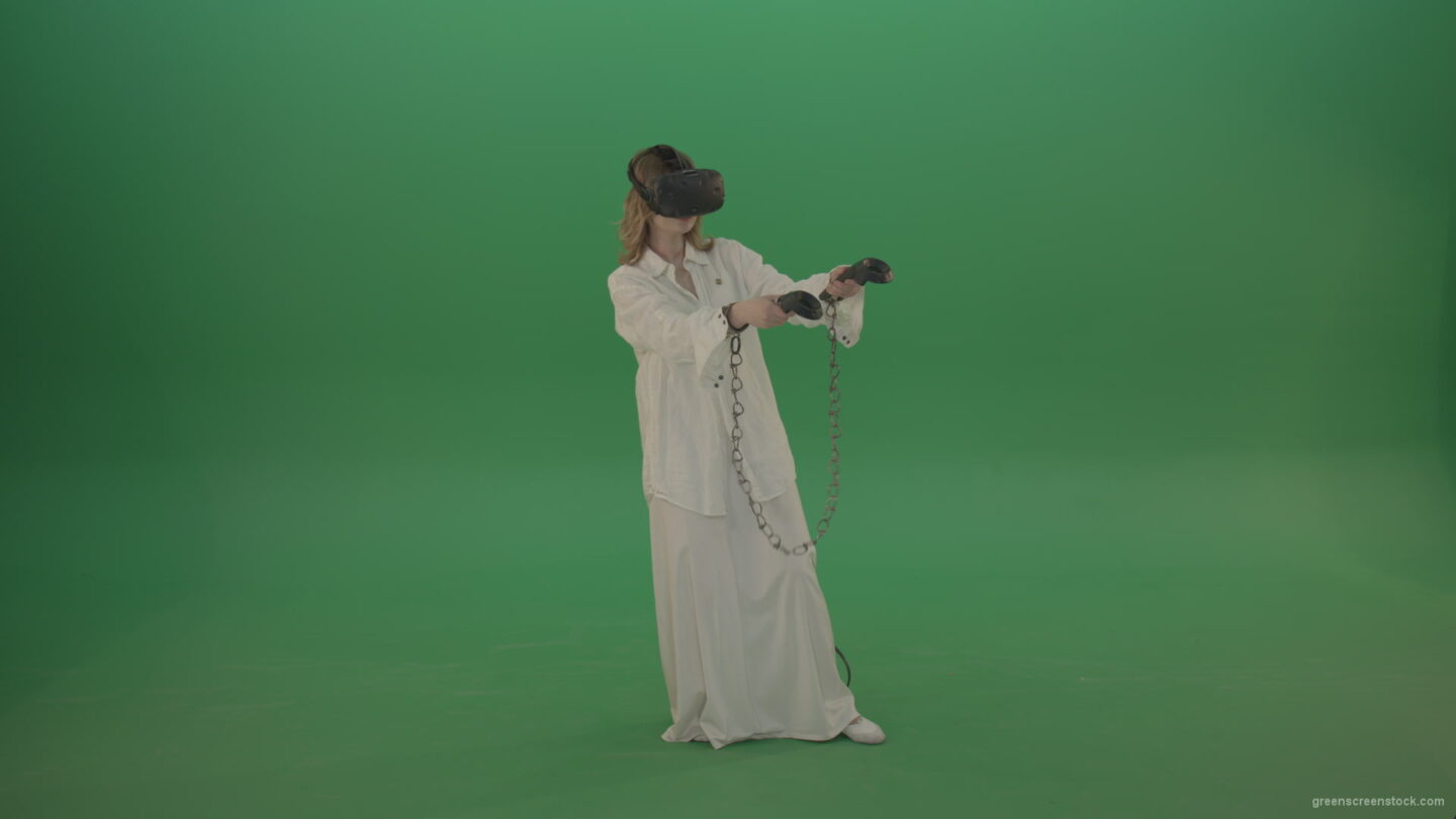 vj video background Girl-in-a-white-spacious-dress-is-wearing-glasses-of-virtual-reality-isolated-on-green-background_003
