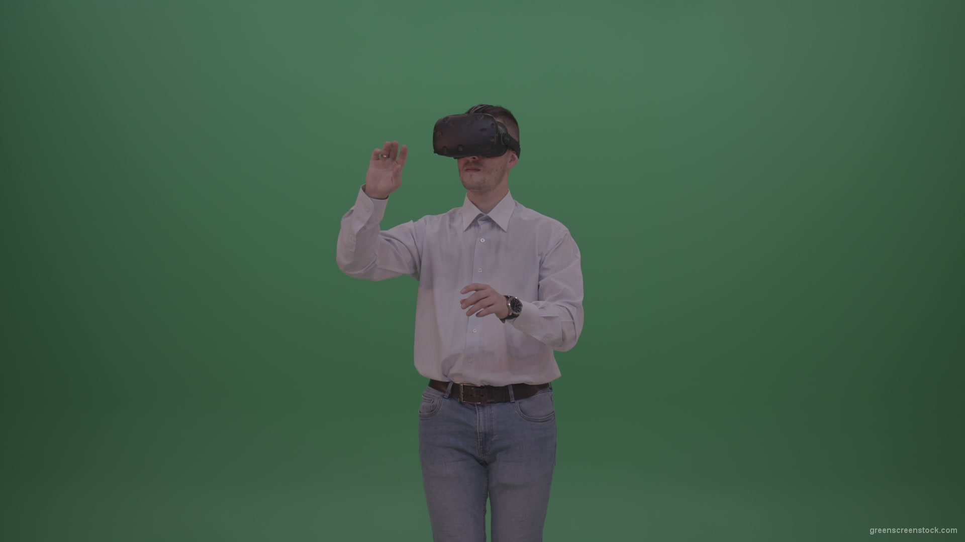 Young_Handsome_Man_With_Black_Hair_Wearing_White_Shirt_Using_Virtual_Glasses_Clicking_Touch_Pad_On_Green_Screen_Background_Wall_004 Green Screen Stock