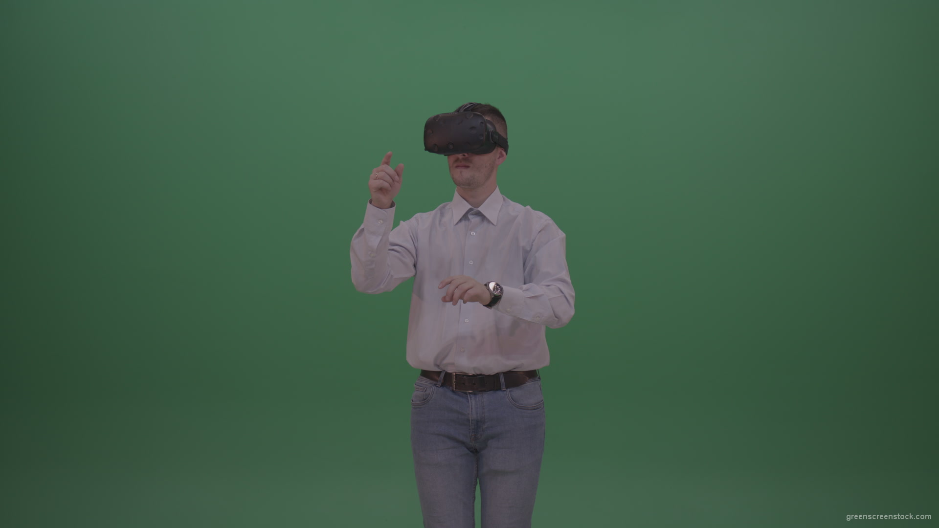 Young_Handsome_Man_With_Black_Hair_Wearing_White_Shirt_Using_Virtual_Glasses_Clicking_Touch_Pad_On_Green_Screen_Background_Wall_007 Green Screen Stock