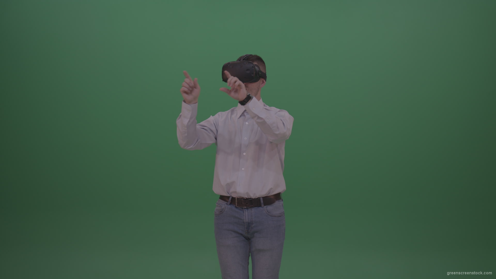 Young_Handsome_Man_With_Black_Hair_Wearing_White_Shirt_Using_Virtual_Glasses_Clicking_Touch_Pad_On_Green_Screen_Background_Wall_009 Green Screen Stock