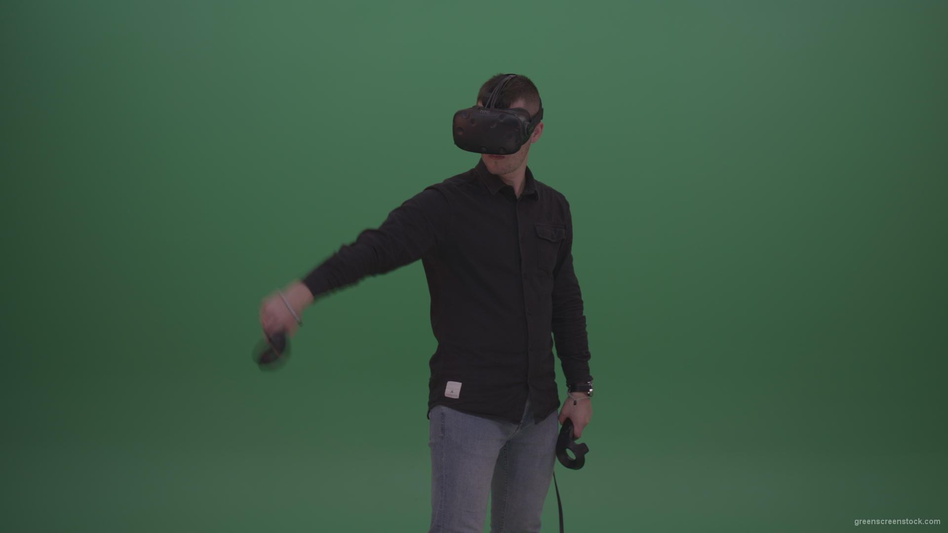 Young_Dangerous_Brunette_Man_Wearing_Black_Shirt_Shooting_Enemies_All_Around_In_Virtual_Reality_Glasses_Green_Screen_Wall_Background_002 Green Screen Stock
