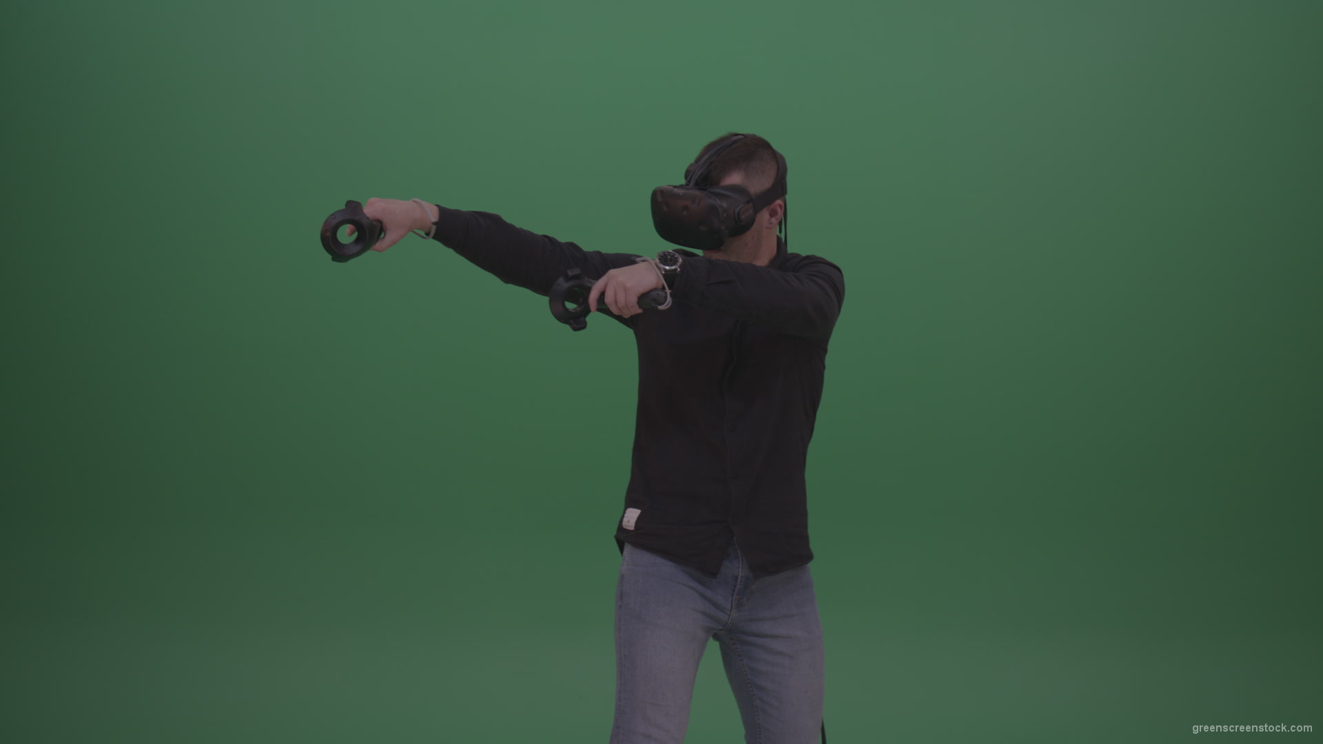 vj video background Young_Dangerous_Brunette_Man_Wearing_Black_Shirt_Shooting_Enemies_All_Around_In_Virtual_Reality_Glasses_Green_Screen_Wall_Background_003