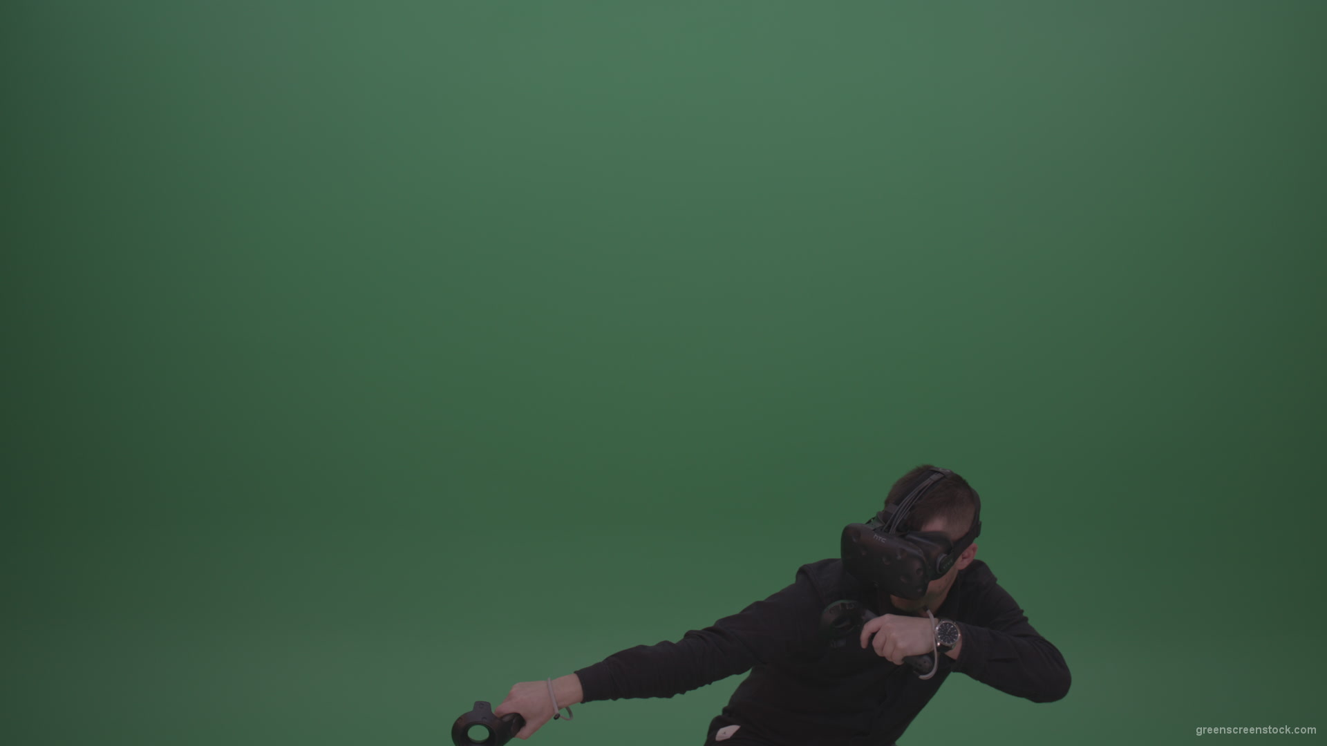 Young_Dangerous_Brunette_Man_Wearing_Black_Shirt_Shooting_Enemies_All_Around_In_Virtual_Reality_Glasses_Green_Screen_Wall_Background_006 Green Screen Stock
