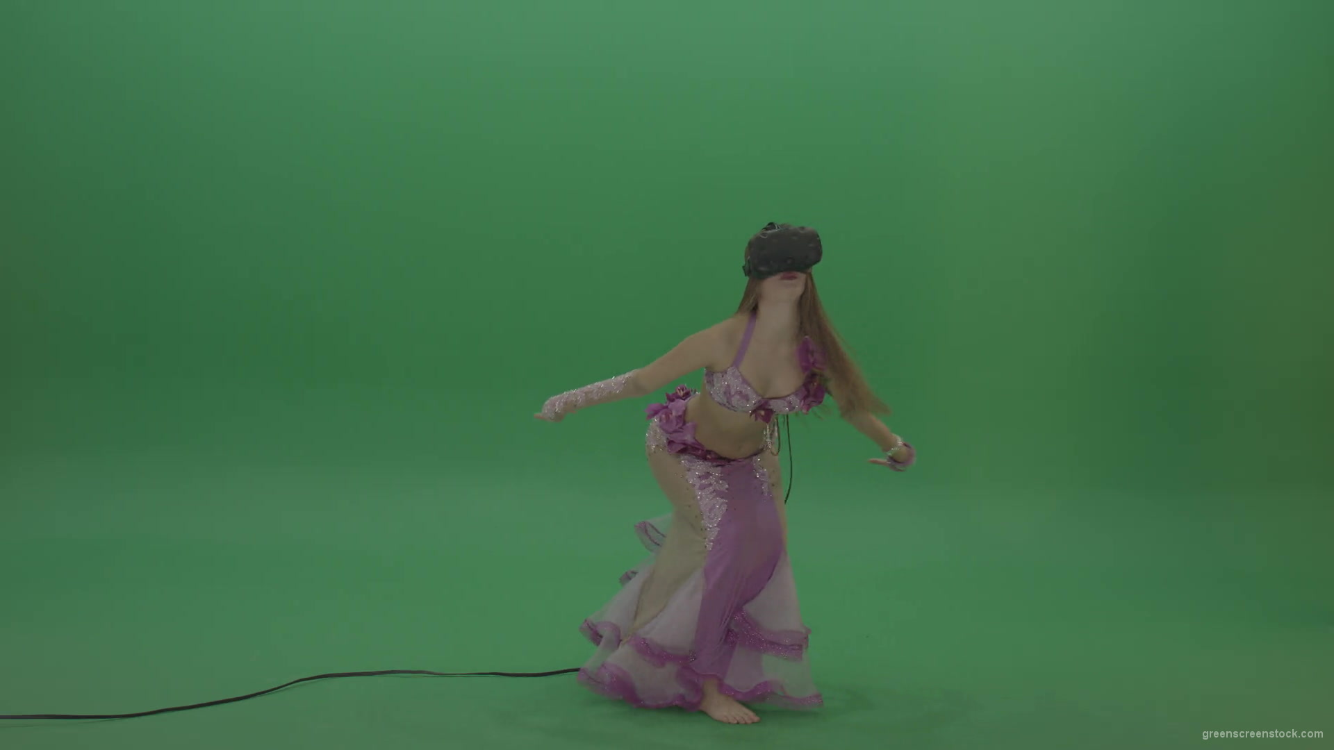 Beautiful-belly-dancer-in-purple-wear-and-VR-headset-dances-over-green-screen-background-1920_005 Green Screen Stock