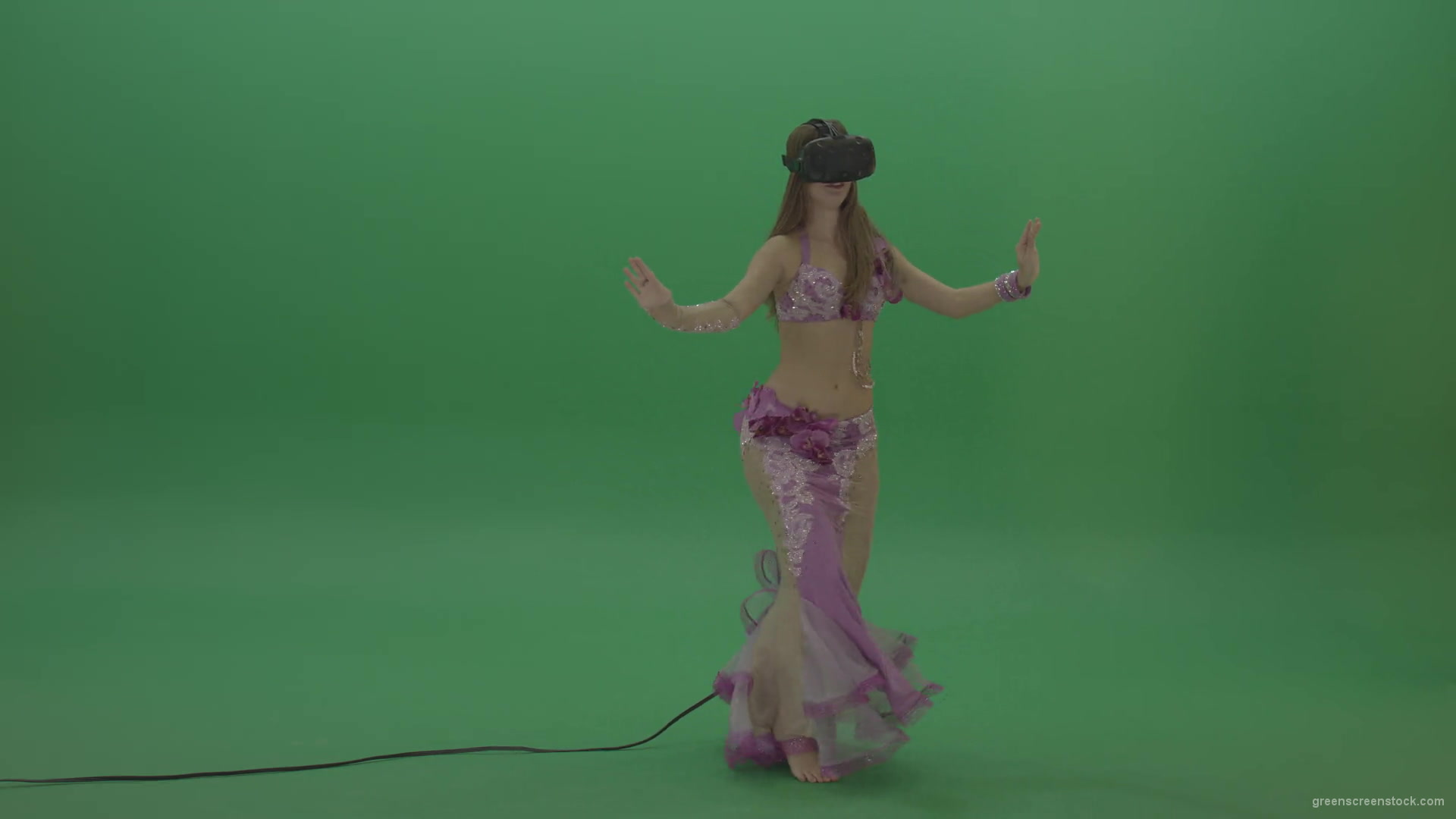 Beautiful-belly-dancer-in-purple-wear-and-VR-headset-dances-over-green-screen-background-1920_007 Green Screen Stock
