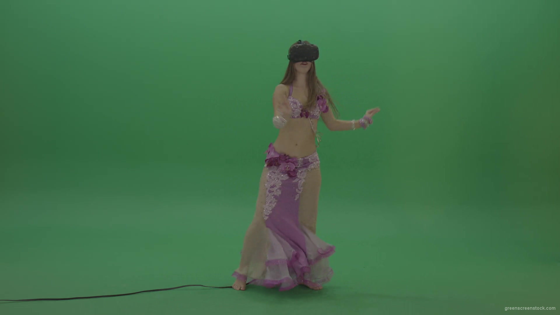 Beautiful-belly-dancer-in-purple-wear-and-VR-headset-dances-over-green-screen-background-1920_009 Green Screen Stock