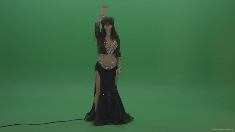 vj video background Beautiful-belly-dancer-in-VR-headset-operates-invisible-screen-over-green-screen-background-1920_003