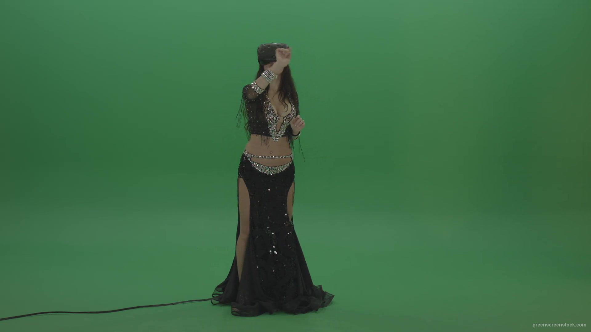 Beautiful-belly-dancer-in-VR-headset-operates-invisible-screen-over-green-screen-background-1920_008 Green Screen Stock