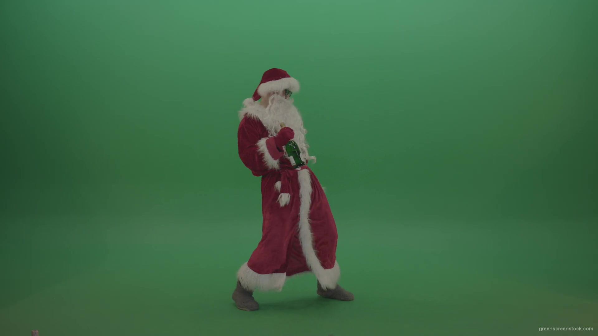 Drunk-santa-in-black-glasses-with-a-bottle-of-wine-staggers-across-the-green-screen-background-1920_008 Green Screen Stock