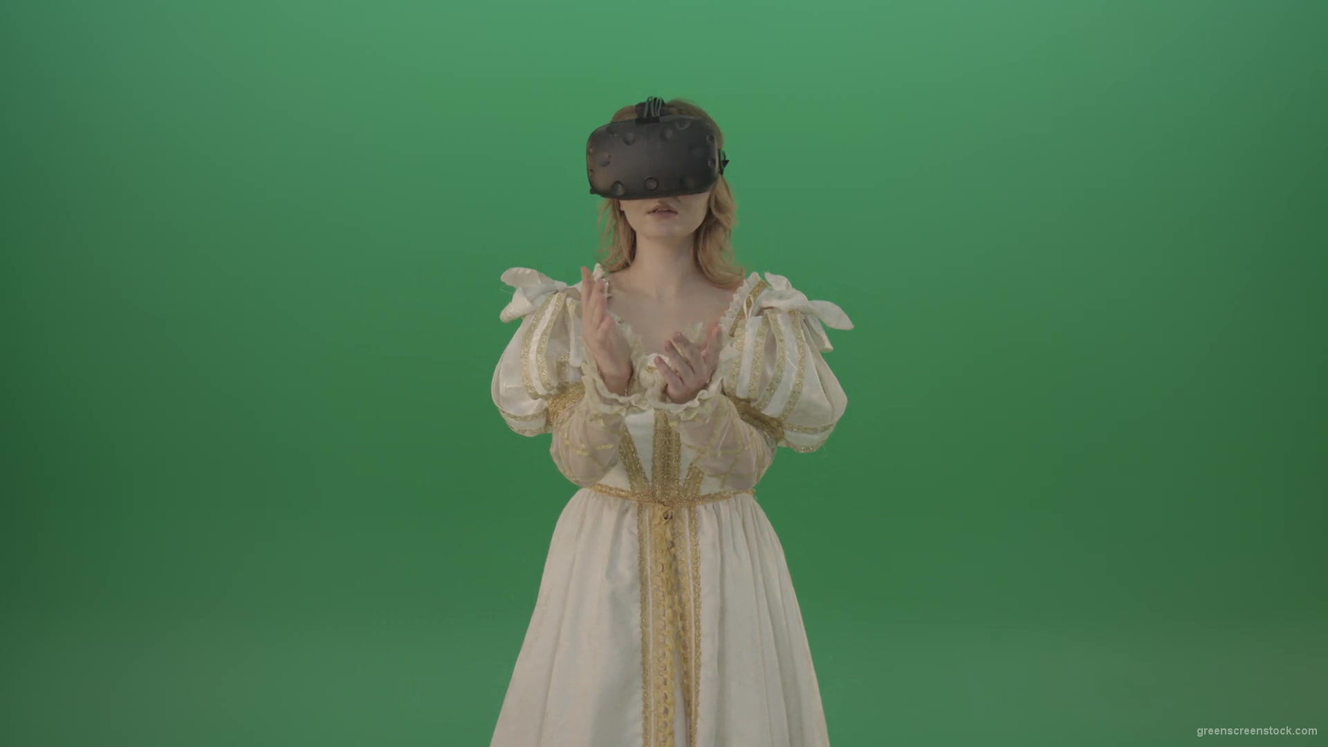 Girl-in-3-in-virtual-reality-has-swallowed-up-in-another-three-dimensional-world-isolated-on-green-screen-1920_007 Green Screen Stock